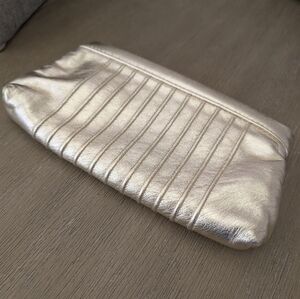 LAUREN MERKIN gold leather clutch